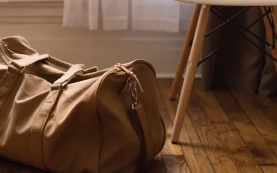 Backpack on floor next to chair