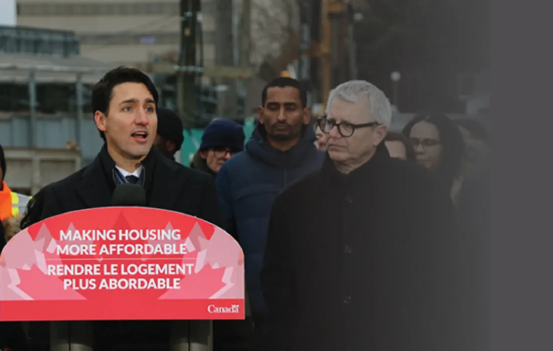 Justin Trudeau annoucing at podium