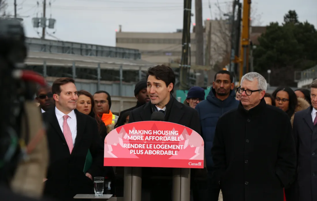 Justin Trudeau speaking at podium in Toronto