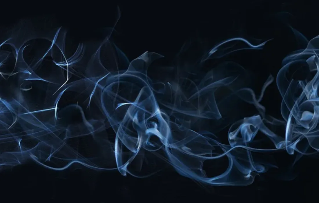 Smoke over black background