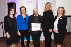 Representatives from LOFT Community Services pose with their 2019 ONPHA Award for Excellence