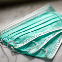 A stack of three medical masks