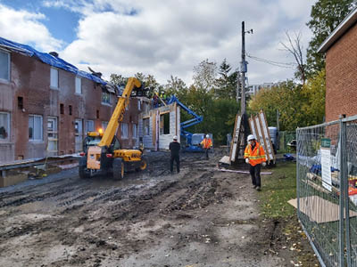 New outer walls being installed on OCH townhomes.