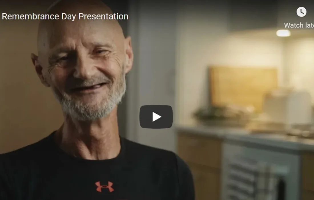 Screenshot of man speaking