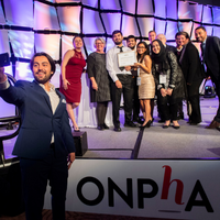 Members receiving the Innovation Award on stage