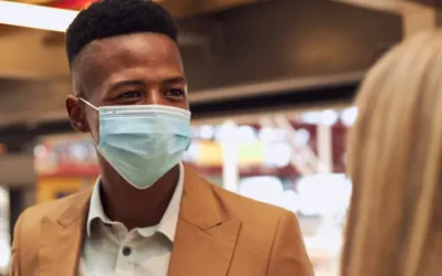 Man wearing a face mask in public space