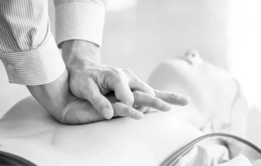 A person doing First Aid CPR Training