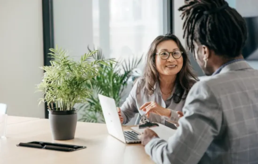 Two people in the office and going over research