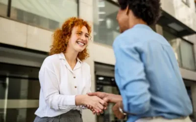 Smiling businesswomen in the city downtown