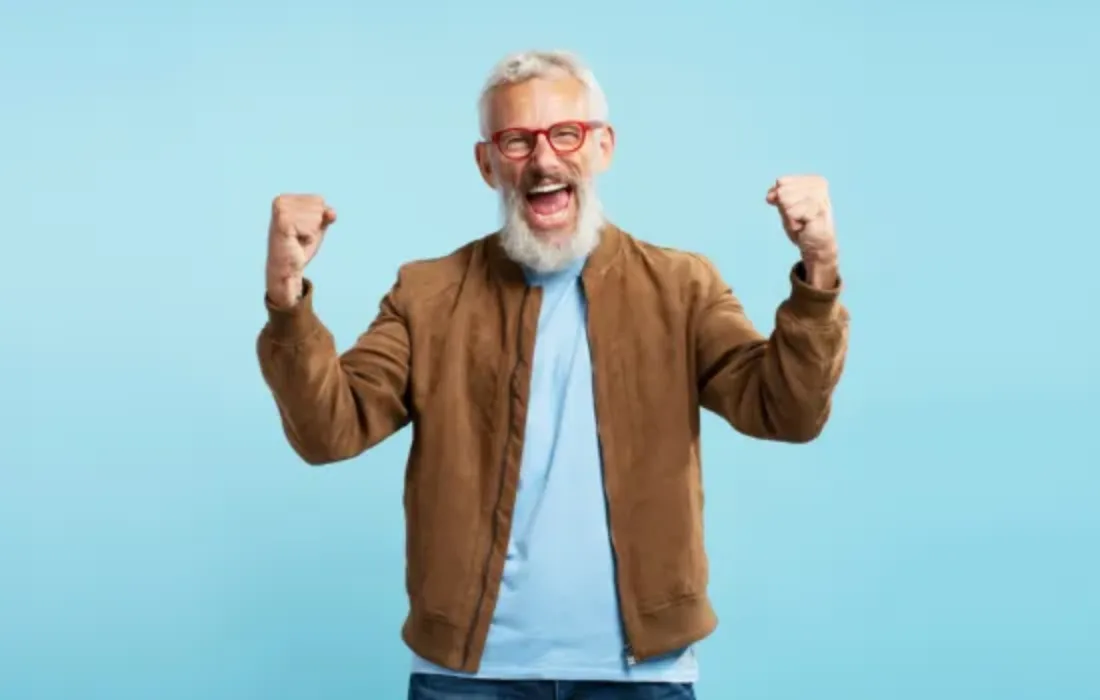 A person celebrating winning an award