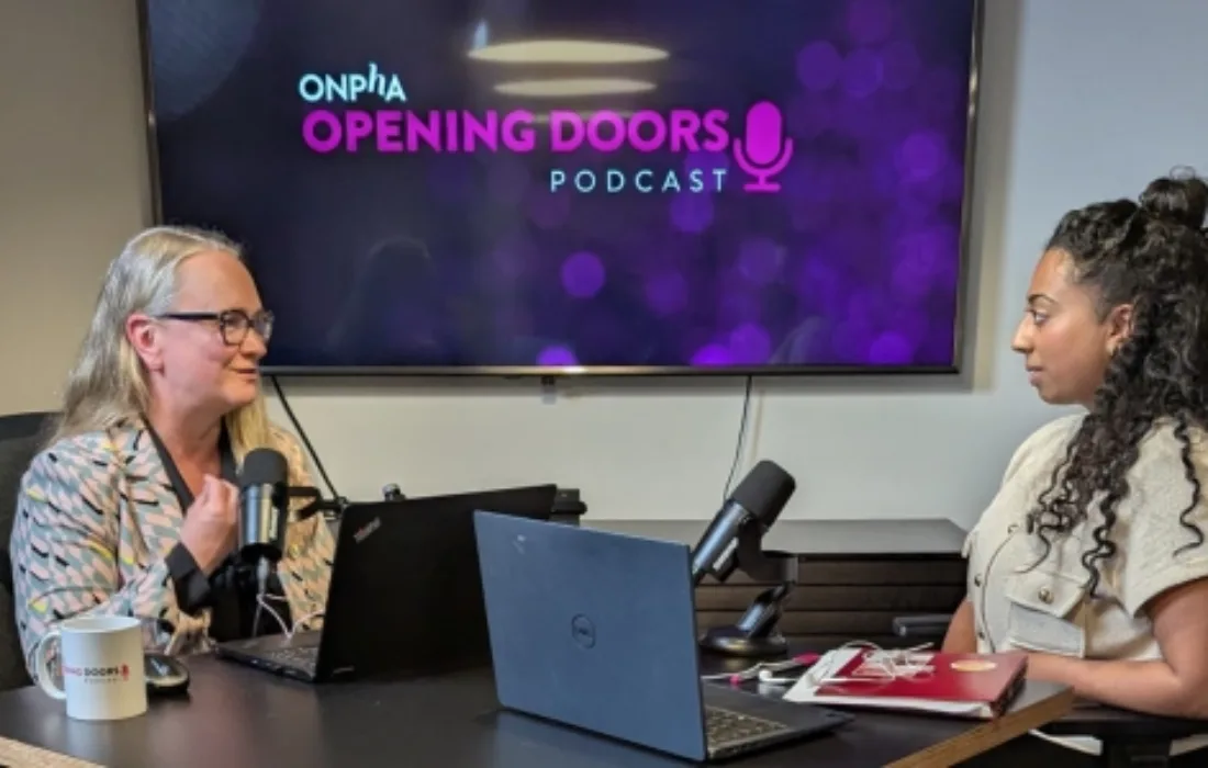 Photo of Marlene Coffey, ONPHA CEO and Alex Armanious, consultant at StrategyCorp, recording an ONPHA Opening Doors Podcast Episode.