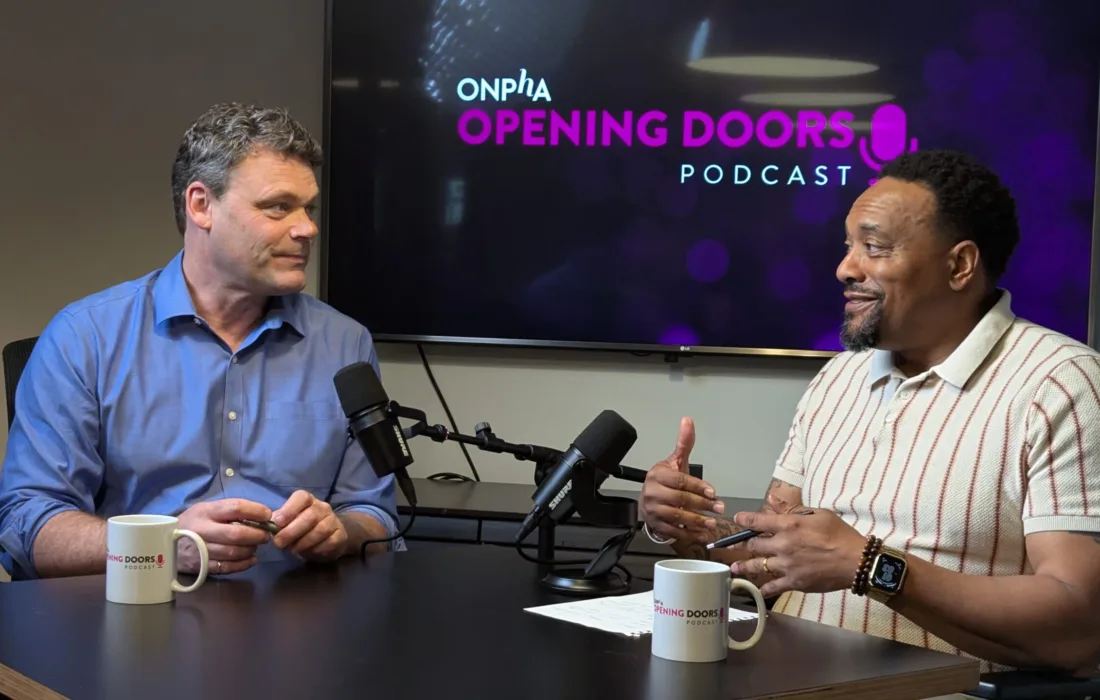Photo of Andrew McKenzie, Director of Operations at ONPHA, and David Rourke, co-founder at Round Table Procurement Services recording an ONPHA Opening Doors Podcast epsiode