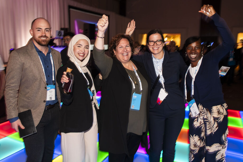 Delegates posing at Community Reception