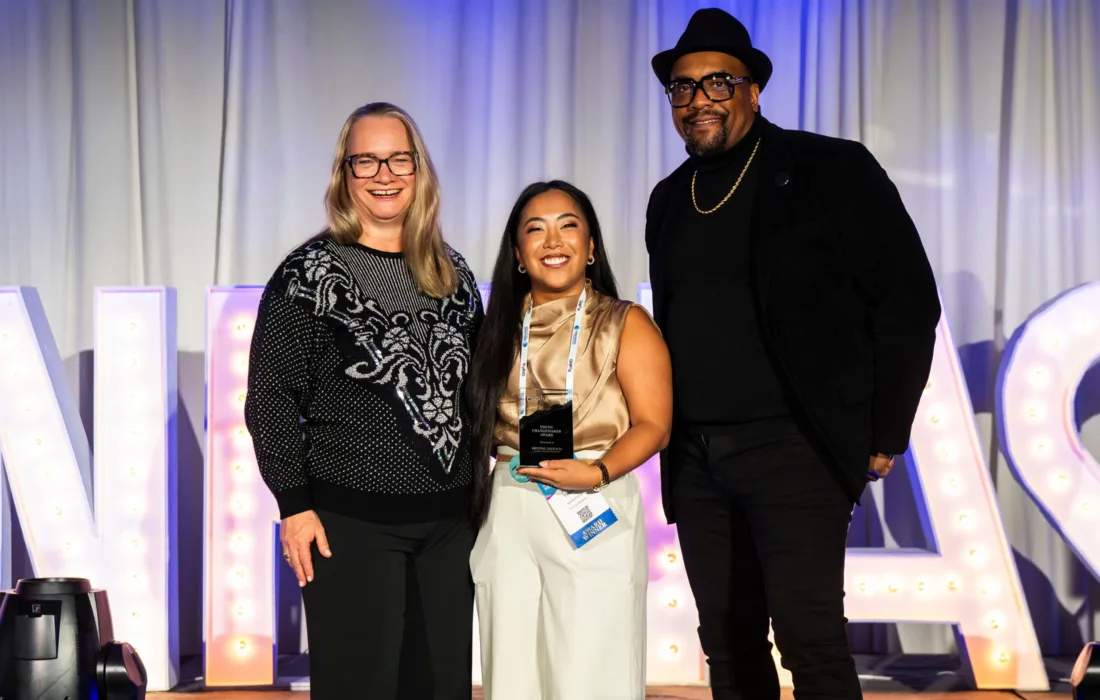 Krystal Valencia receiving the ONPHA Young Changemaker Award at the 2025 ONPHA Conference