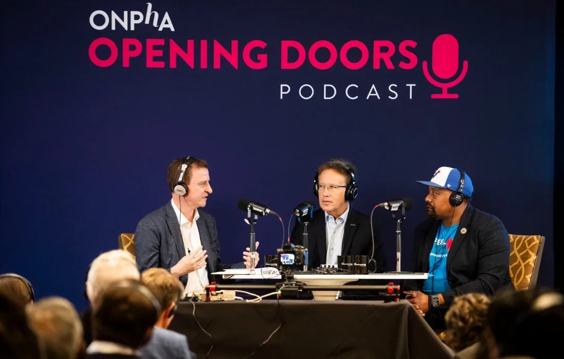 Sean Baird (Toronto Community Housing Corporation), Stéphane Giguère (Ottawa Community Housing), and Andrew McKenzie (Ontario Non-Profit Housing Association) recording an Opening Doors podcast