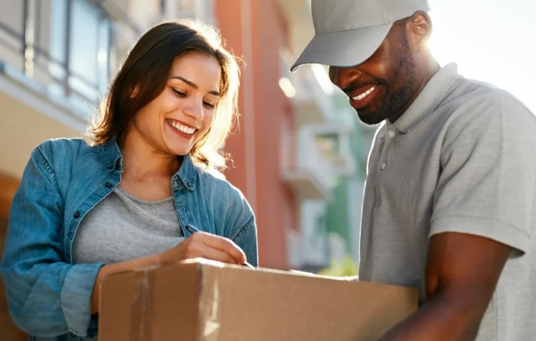 Woman signing for a delivery